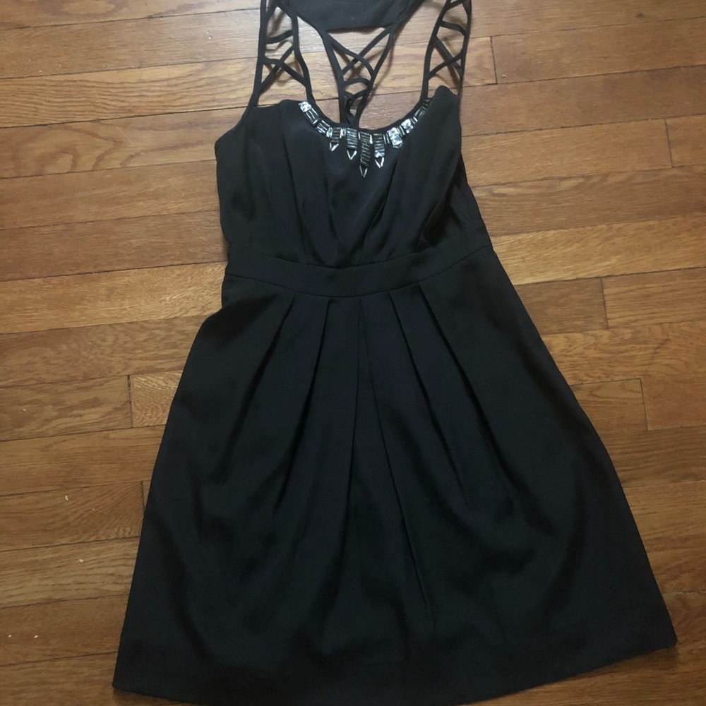 BCBG steampunks dress with beading detail!